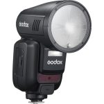 فلاش اسپیدلایت Godox V100 با بدنه‌ای جمع‌وجور و سر گرد.